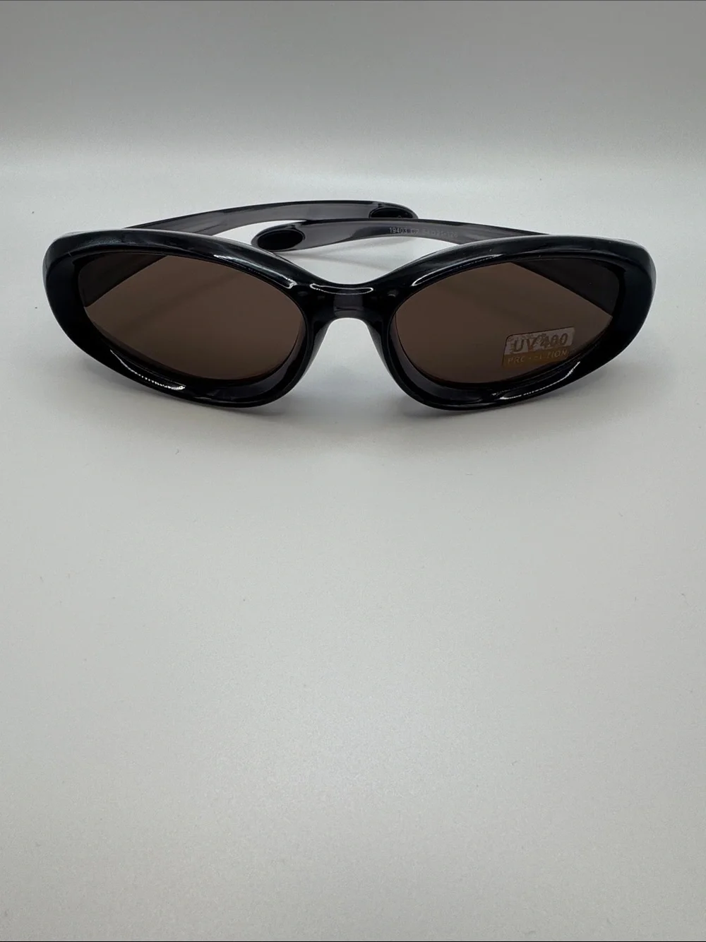 Women's Black Oval Sunglasses with Brown Lenses - UV400 Protection